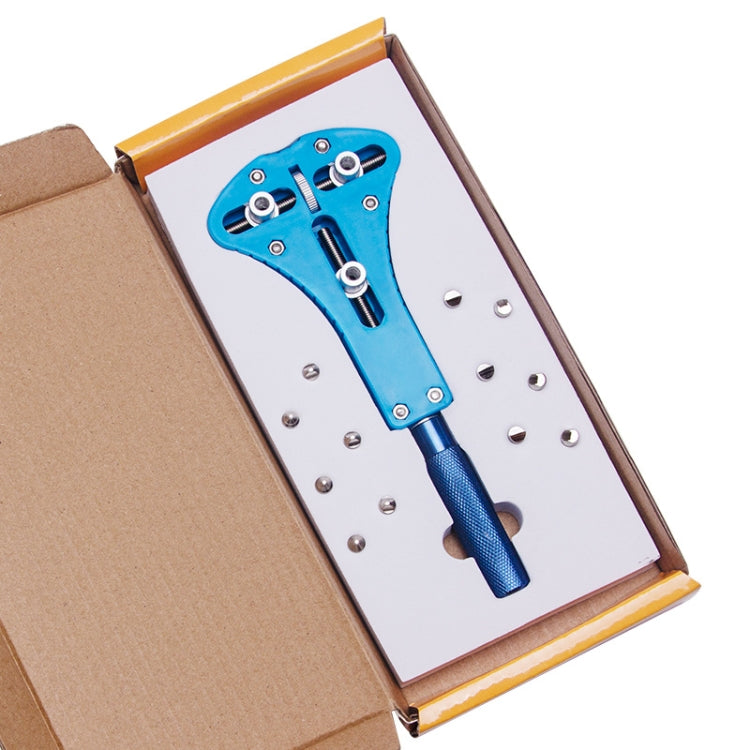 Three-prong watch opener tool with blue body and silver handle in box