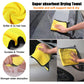 Yellow super-absorbent car drying towel with black edging and hanging loop