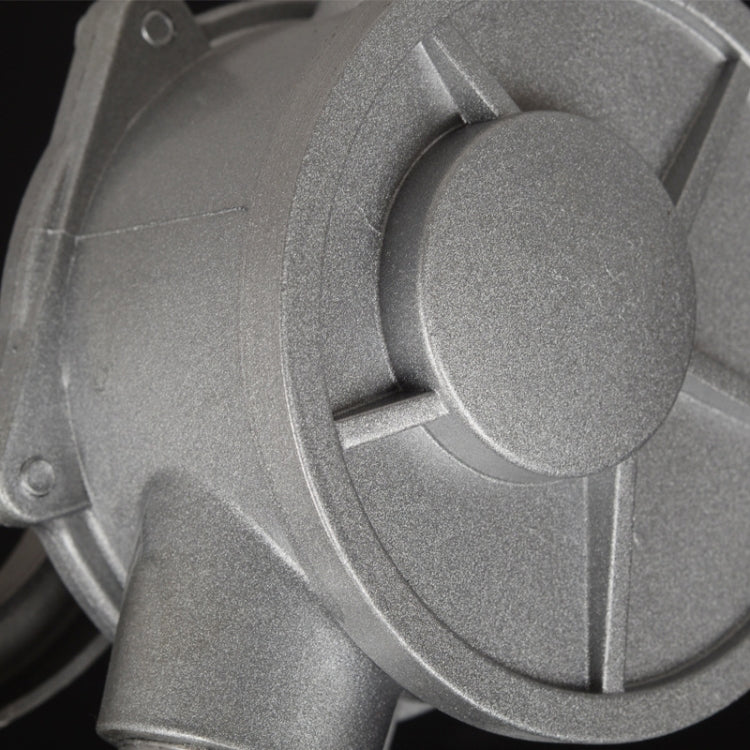 Silver alloy oil pump head with round cap and internal valve details