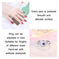 Adjustable silver-tone open ring with blue center stone and clear crystal accents