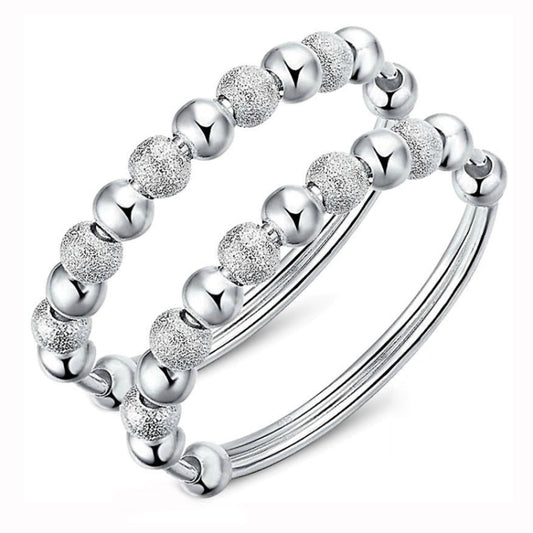 Silver-tone beaded bracelet set with glitter round beads and smooth ball links