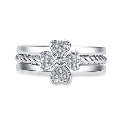 Silver open adjustable ring set with four-leaf clover charm and clear crystal stones