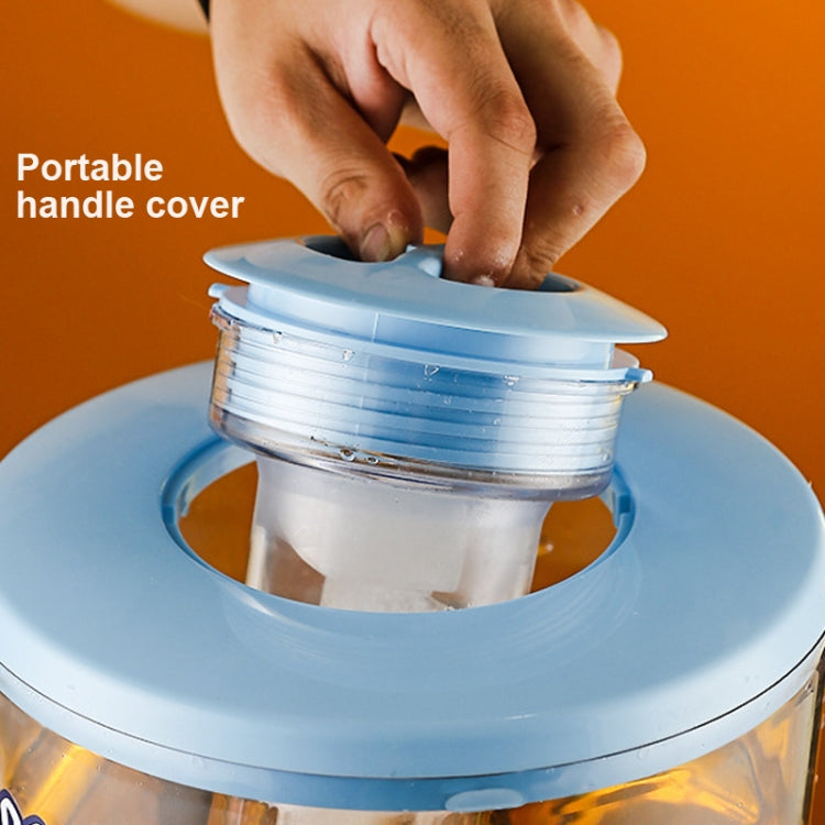 Blue acrylic dispenser lid with portable handle cover; close-up of hand
