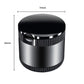 Metallic car ashtray with LED ambient light, lid closed and textured grip band.