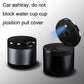 Black car ashtray with LED ambient light, open top with blue star glow on lid.