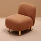 Upholstered armchair with stainless steel support legs, visible seat base and feet
