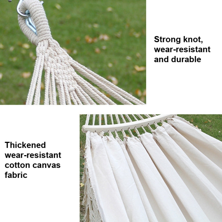 White hammock detail showing thickened canvas and strong braided knot cords.