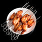 Cooked lamb skewers on a metal rod rack above a serving plate