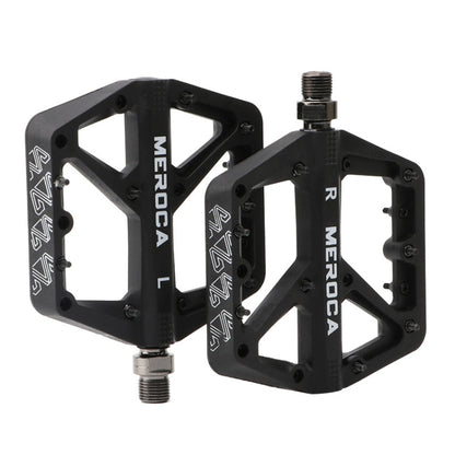 Black MEROCA mountain bike nylon pedal pair with threaded axles and grip pins