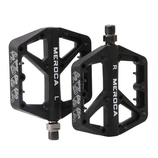 Black MEROCA mountain bike nylon pedal pair with threaded axles and grip pins