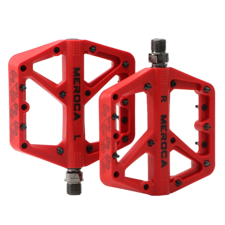 Red MEROCA mountain bike nylon pedal pair with threaded axles and grip pins