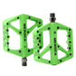 Green MEROCA mountain bike nylon pedal pair with threaded axles and grip pins