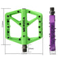 Green and purple MEROCA mountain bike nylon pedals with size measurements diagram