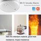 White Wi-Fi smoke alarm with vented top cover and small sensor opening