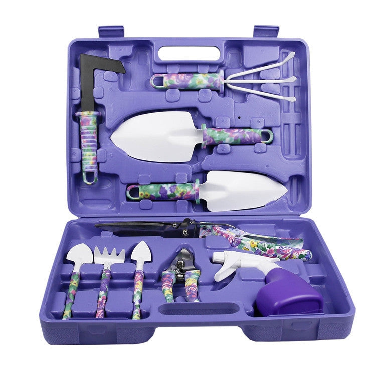 Purple potted gardening tool set in storage case with assorted hand tools
