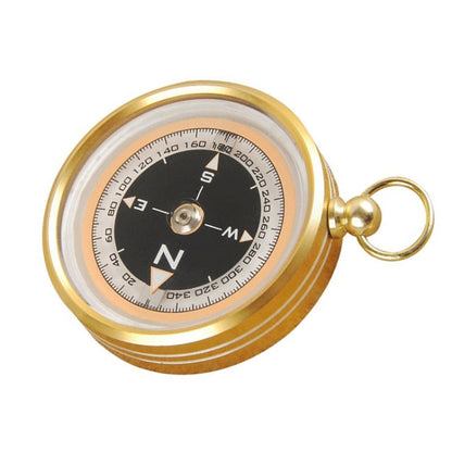 Gold metal portable compass with clear window, black dial, and keyring loop.