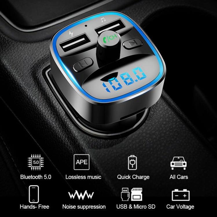 Black car MP3 Bluetooth player charger on dashboard with blue LED screen and buttons