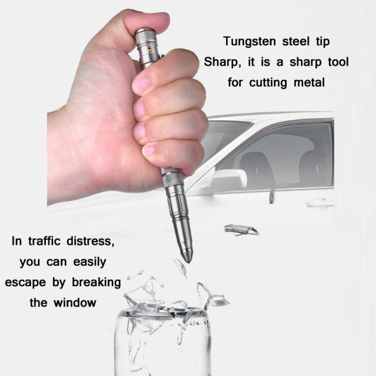 Tungsten-steel tipped LED safety pen held near car window with broken glass