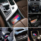 Car interior wireless charging showing a smartphone charging on the pad