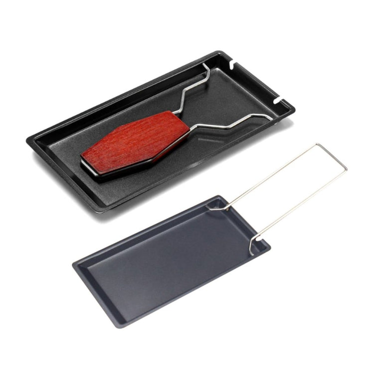 Mini cheese grill set with black tray, red wooden handle, and spare insert