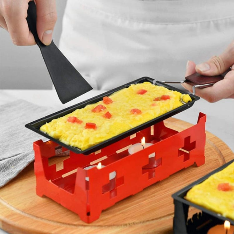Mini cheese grill with black tray, red base, and black wooden handle