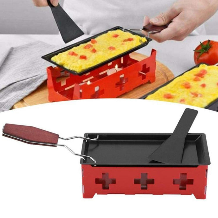 Mini cheese grill with black tray, red base, and brown wooden handle