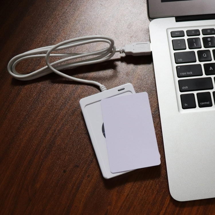 Contactless IC card reader with connected white USB cable