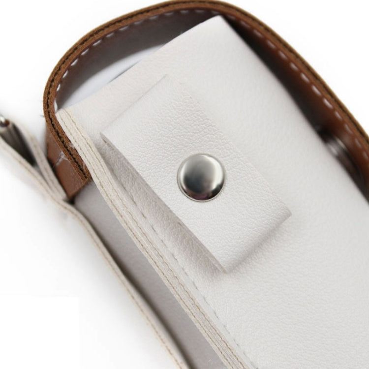 Close-up of light gray leather mini golf protective bag with brown edge trim and metal snap