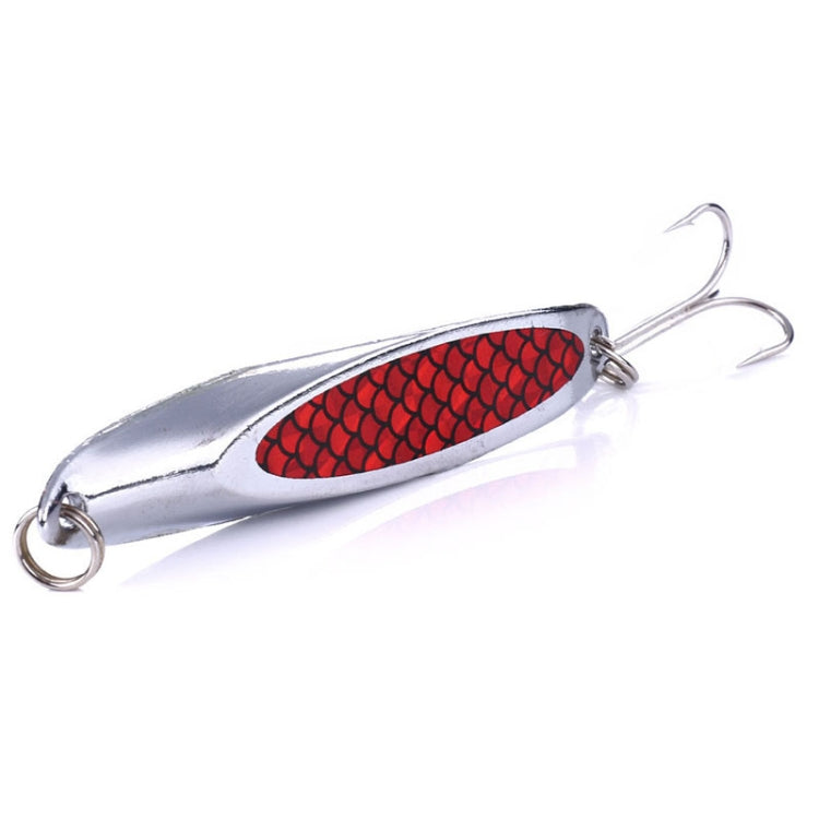 Silver fishing lure with red scale-pattern oval sequin body and two treble hooks