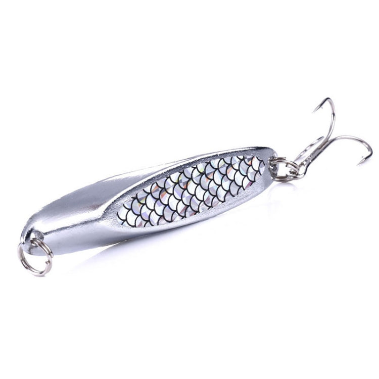 Silver fishing lure with white scale-pattern oval sequin body and two treble hooks
