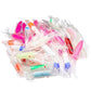 Assorted colorful octopus-style fishing lures with glitter bodies and white tentacles