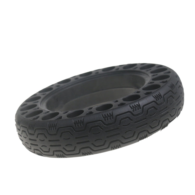 Black rubber solid tire tread with molded channels