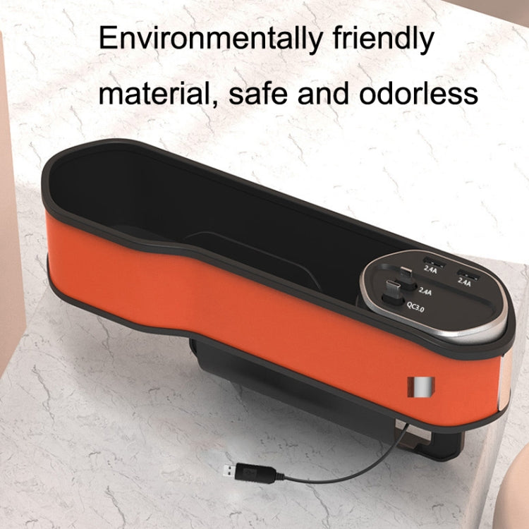 Car seat slot storage box with USB charging module on orange top