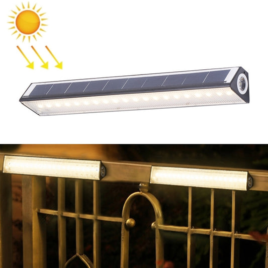 Outdoor solar LED light bar with dark frame and clear light panel