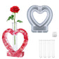 Heart-shaped epoxy vase mold in gray with heart cutout and clear test tubes