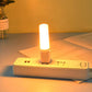 USB LED flame lamp lit on a power strip outlet board
