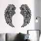 Black engraved metal angel wings wall hanging pair, symmetrical wing cutouts, no lights