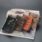 Assorted leather-look tri-fold short wallets with double zippers and chain straps