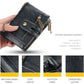 Black leather-look tri-fold short wallet close-up with double zippers and card window