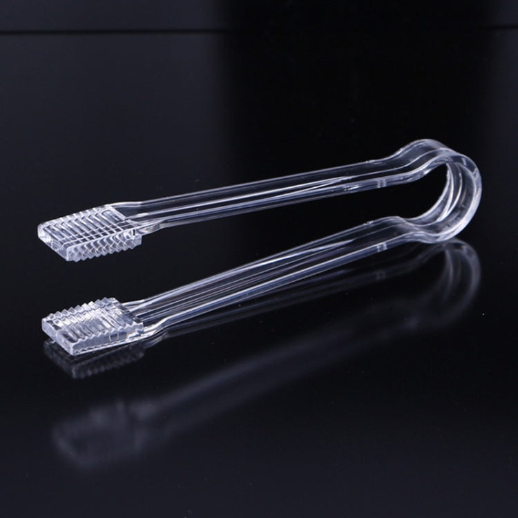 Clear plastic ice holder tong pair with serrated end grips, bar accessory