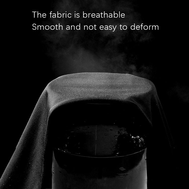 Dark gray satin fabric draped over a rounded object, smooth and glossy