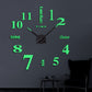 DIY digital wall clock with black hands and glowing green numerals