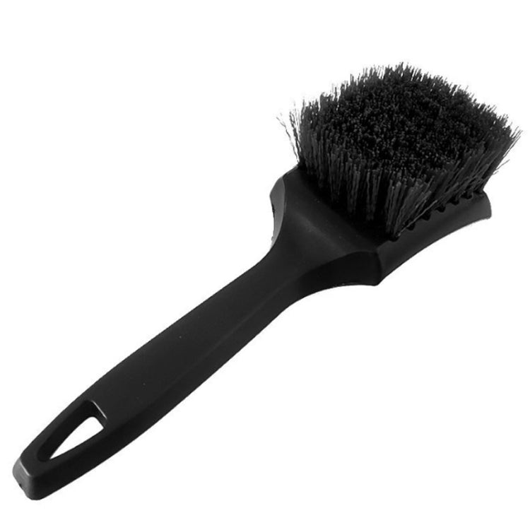 Black bristle tire and upholstery cleaning brush with ergonomic handle and loop grip