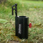 Black canopy pole holder with red knob and metal mounting bracket on grass