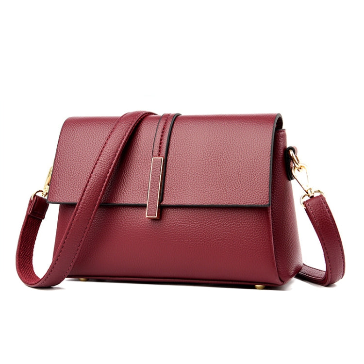Red small square single-shoulder messenger bag with structured front flap and gold hardware