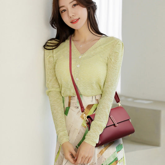 Red small square single-shoulder messenger bag worn crossbody with front flap