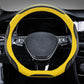 Leather steering wheel cover, black with yellow outer trim and contrast stitching, front view