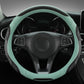 Leather steering wheel cover, black with teal outer trim and contrast stitching, 38 cm