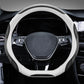 Leather steering wheel cover with black center and white edge trim
