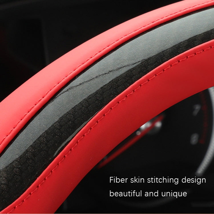 Red leather steering wheel cover with contrast stitching along the grip edge
